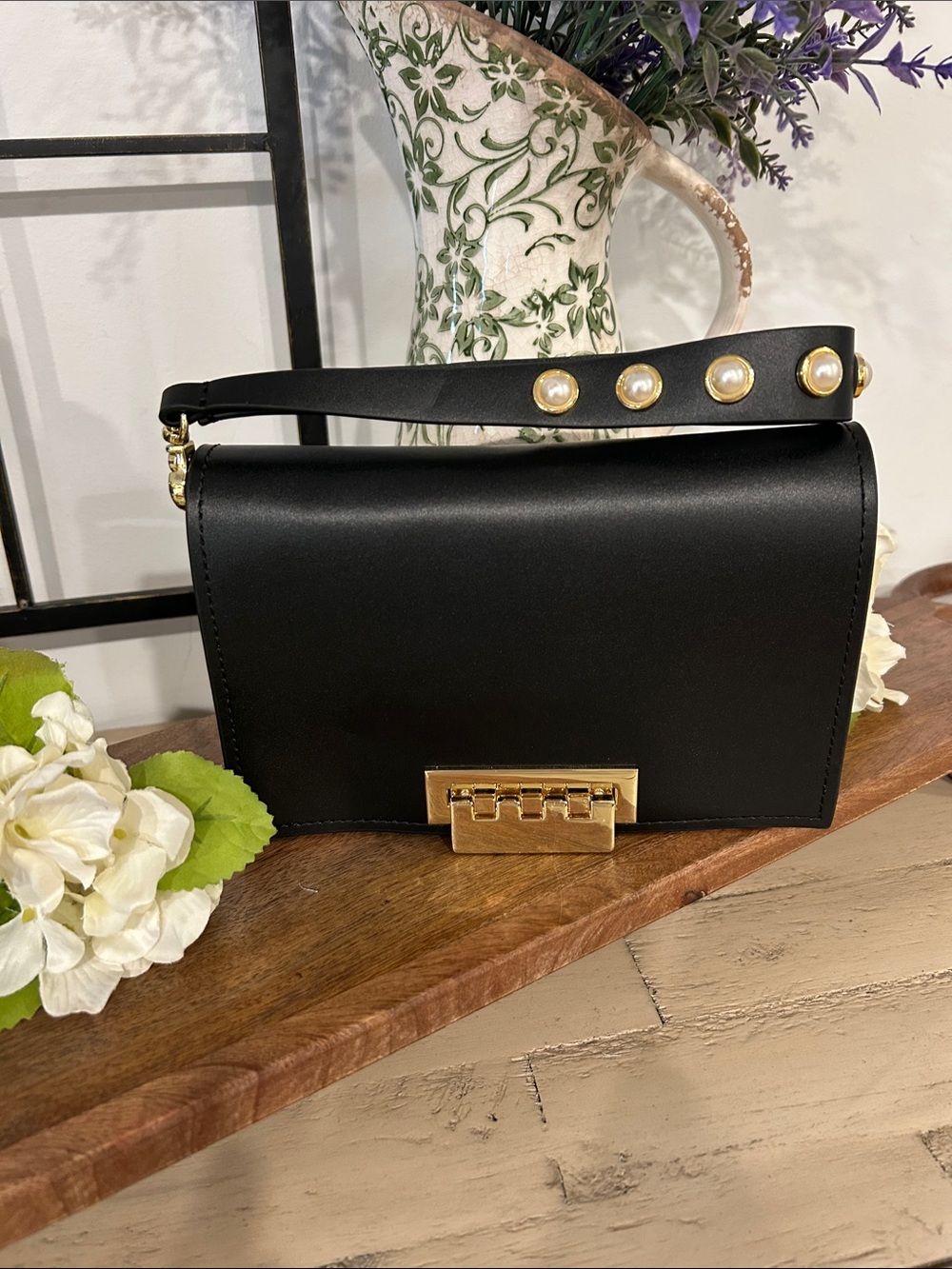 Zac & Rachel Black Crossbody with Gold Hardware and Pearl-Stud Strap
